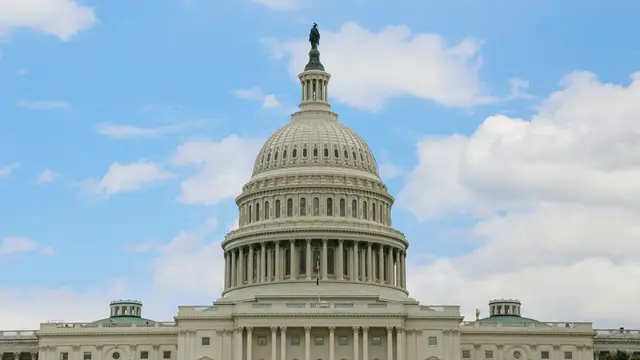 The U.S. Capitol under a blue sky